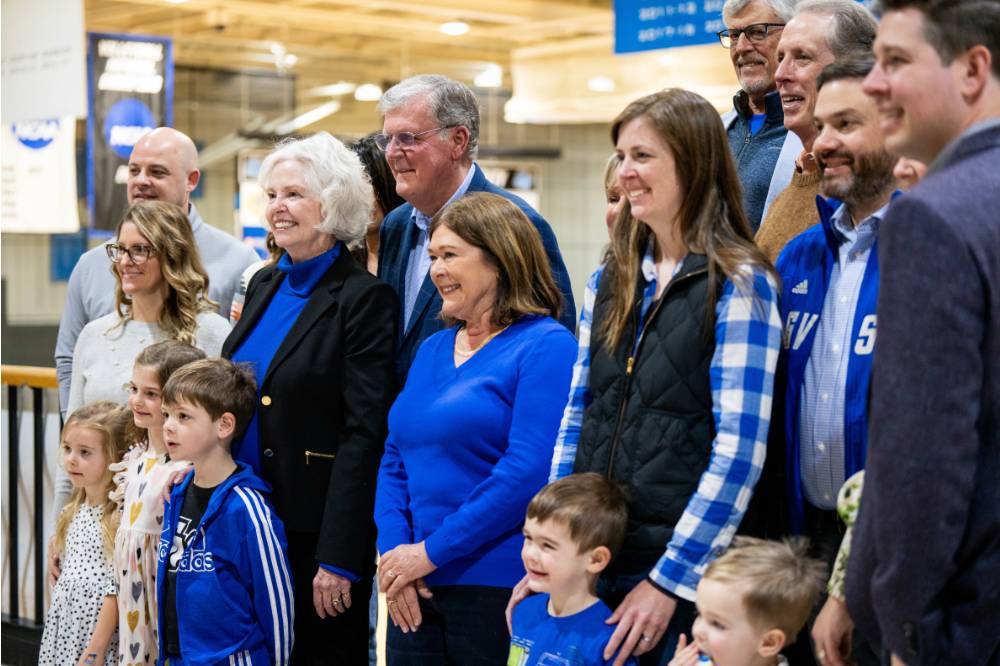 Haas' family happy in a pose